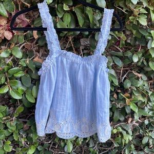 The blouse/tank is loose fitted and very flattering.